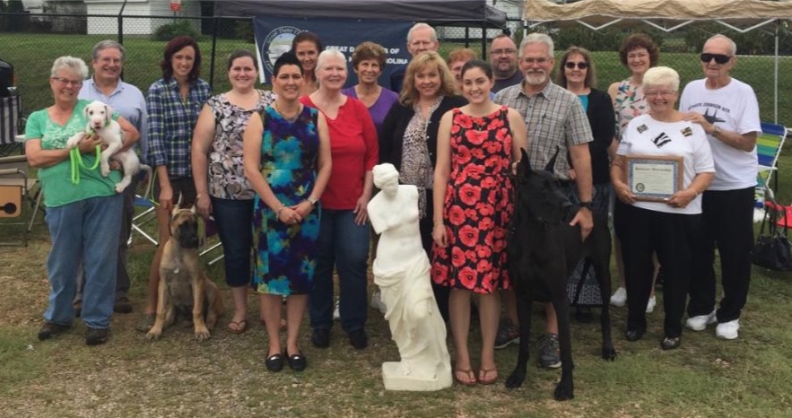 Club Members and Guests posing for a photo with our "mannequin".